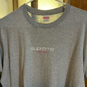 Supreme tee size large